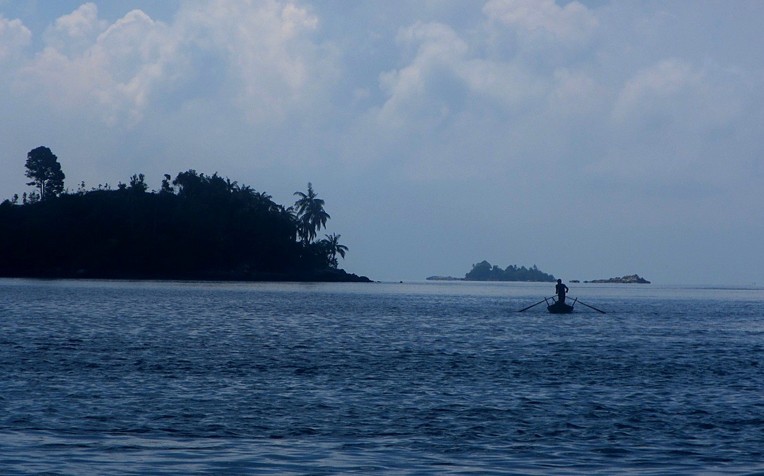 Merapas island seen across open water