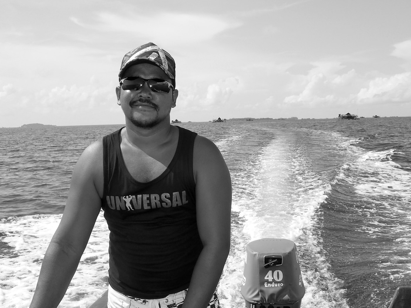 Heading out to Penyusuk by boat